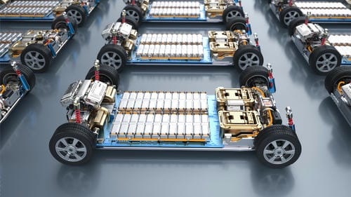 A lineup of electric vehicle skateboard platforms, showcasing integrated battery packs and drive systems.
